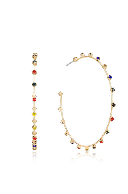 A pair of earrings is displayed: one is a long, vertical bar adorned with colorful gemstones, while the other is a circular hoop featuring scattered gemstones. The background is plain, emphasizing the jewelry.