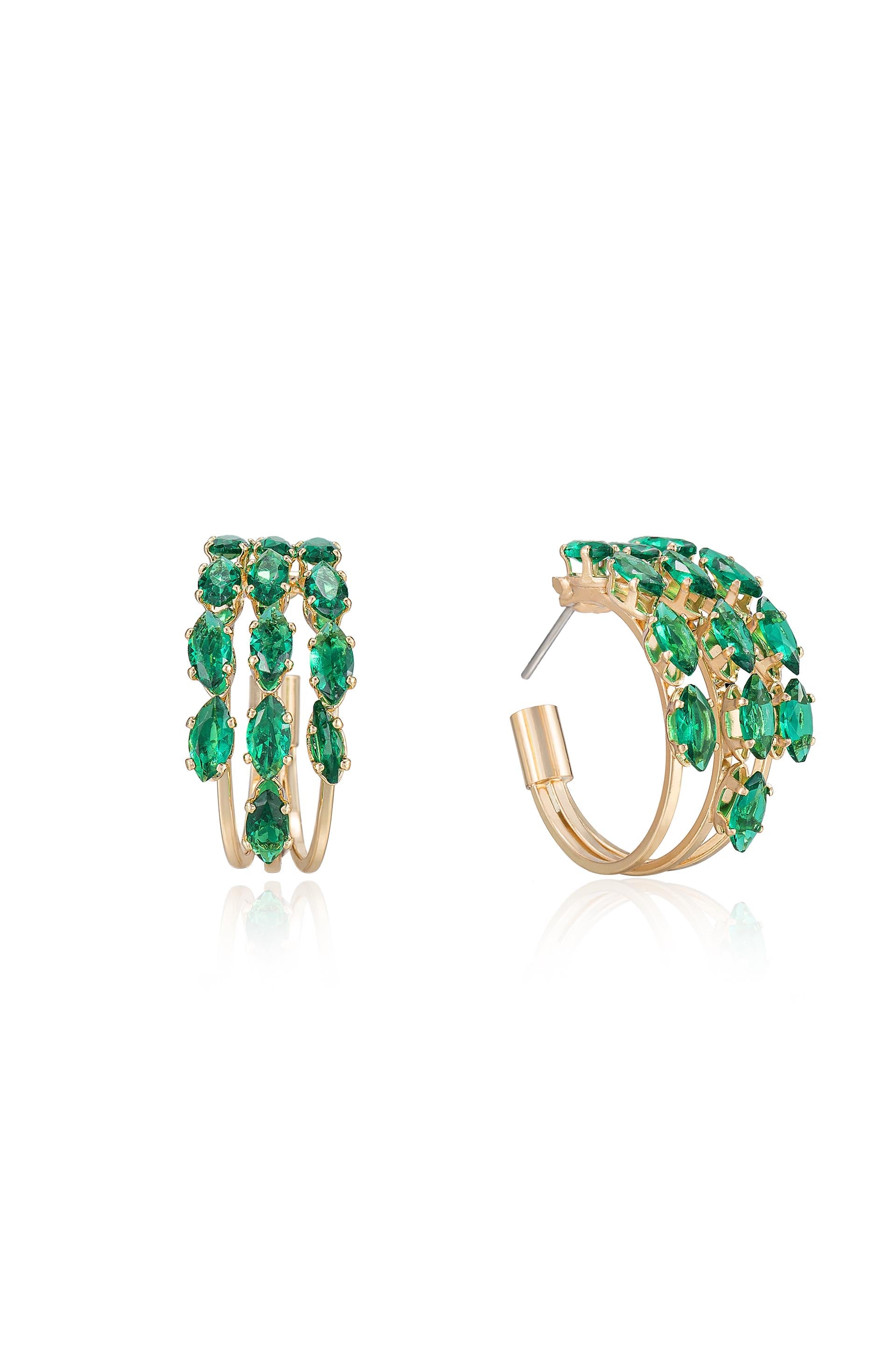 Gold hoop earrings are embellished with multiple green gemstones, showcasing a cascading design. They are displayed against a light background, emphasizing their sparkle and elegance.