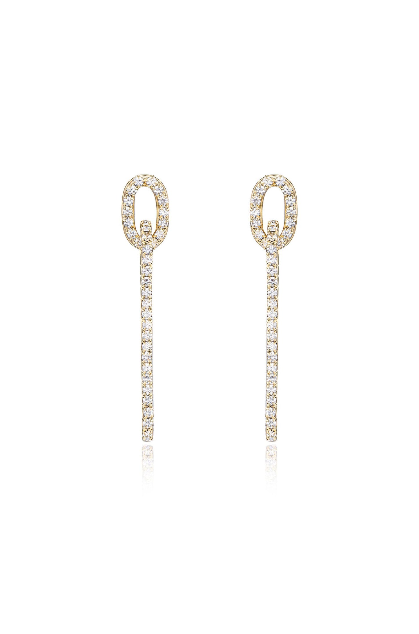 Two elegant golden earrings hang vertically, featuring a circular top and a linear drop adorned with sparkling crystals, set against a clean, bright background.