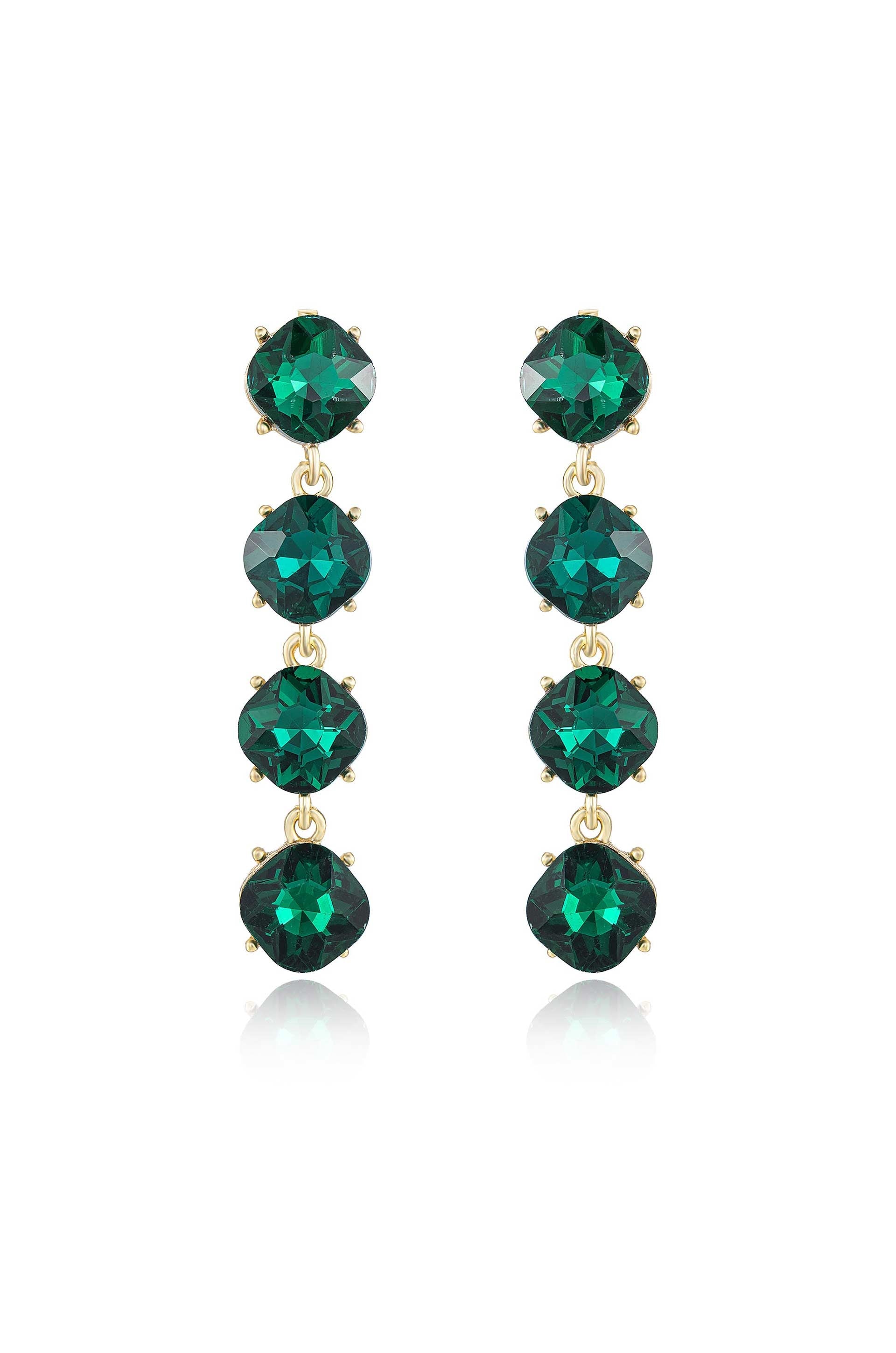 Long, elegant earrings feature five green gemstones, each encased in gold metal settings. They hang vertically, reflecting light, against a plain white background, emphasizing their color and sparkle.