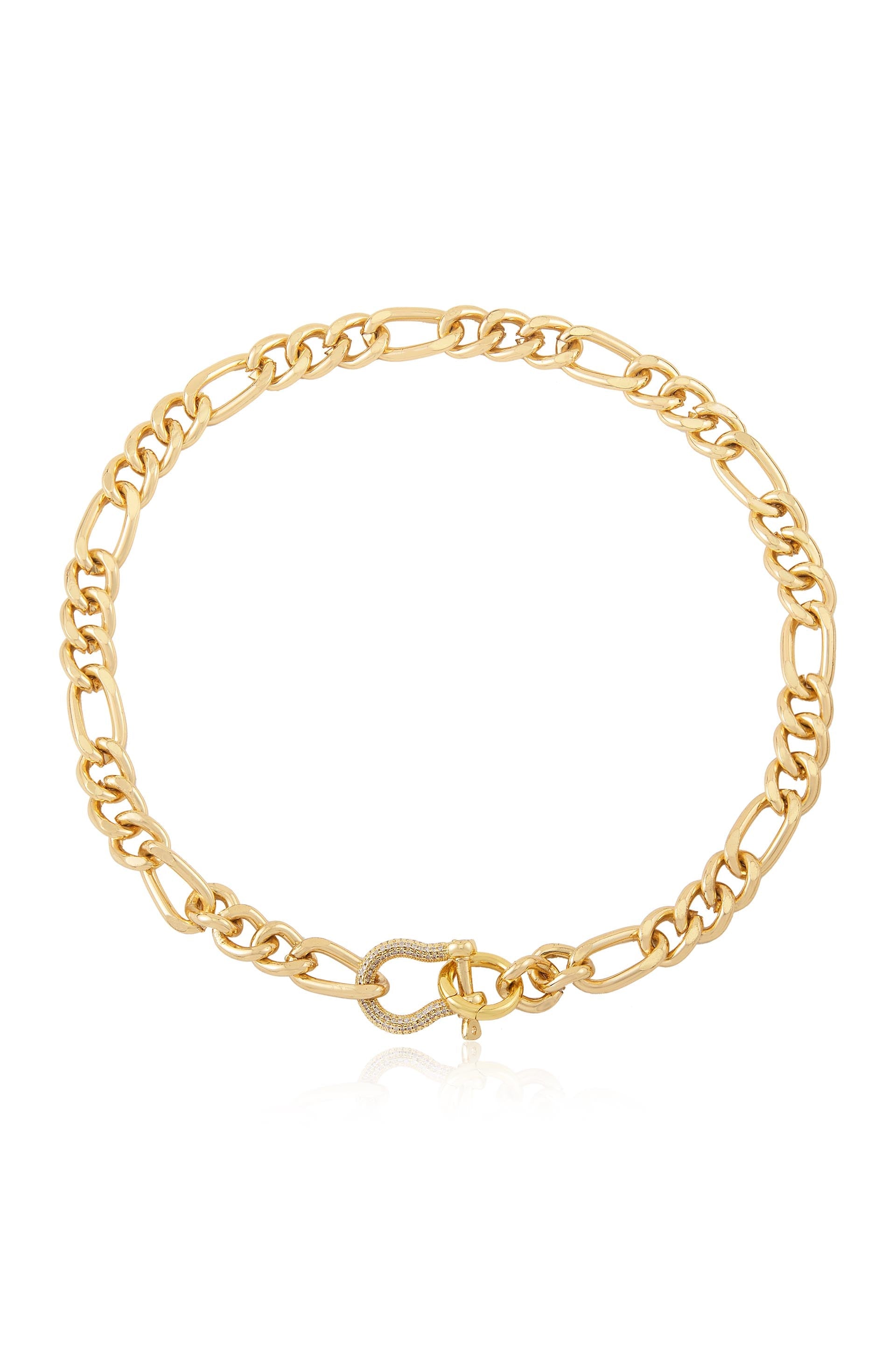 A gold chain necklace features interlinked oval and round links, displaying a shiny finish. Its clasp, designed in a hook shape, secures the necklace. The background is plain.