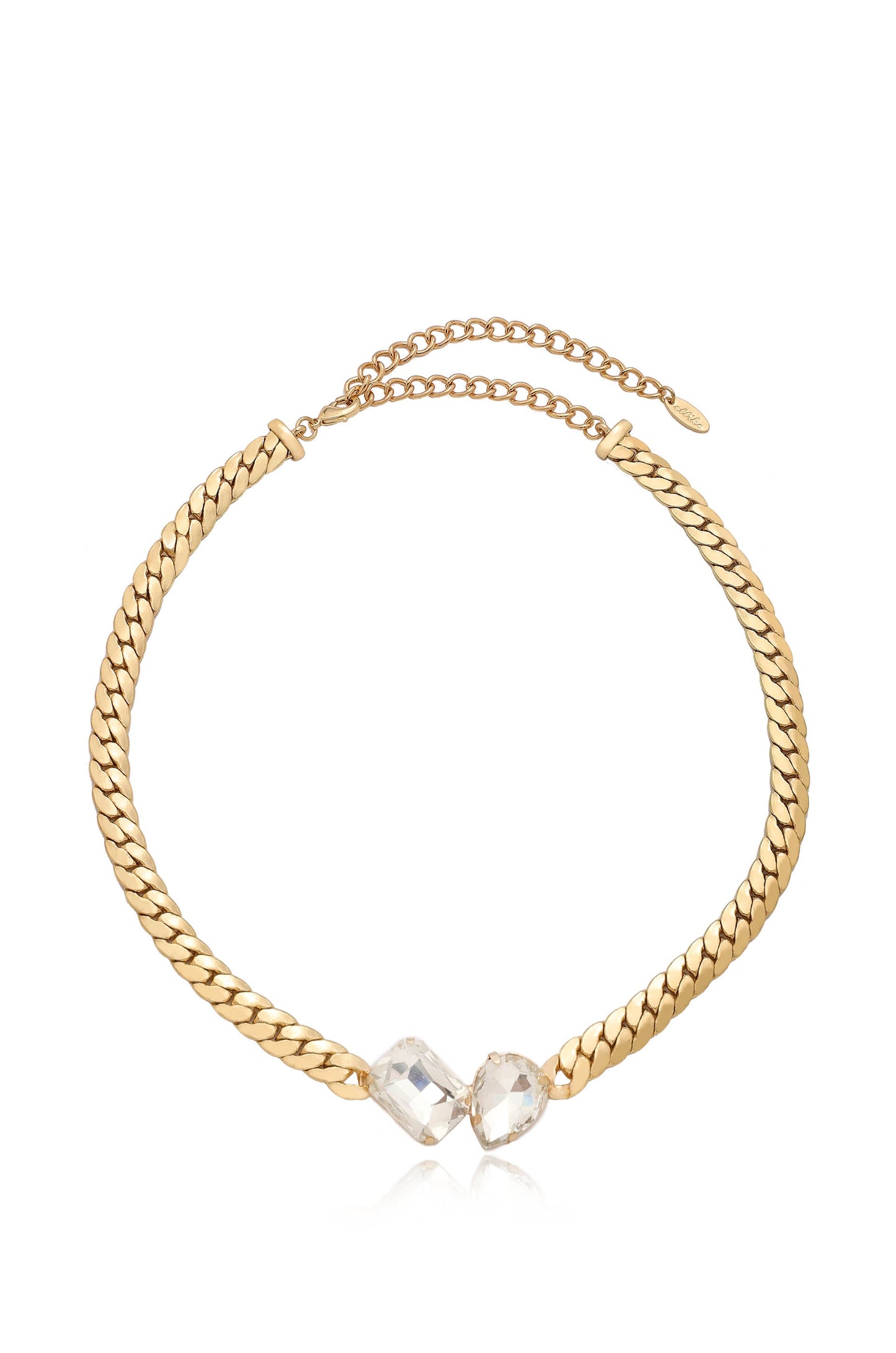 A gold chain necklace features a woven design with two faceted clear crystals at the center. It is elegantly displayed against a neutral background, emphasizing its stylish appearance.