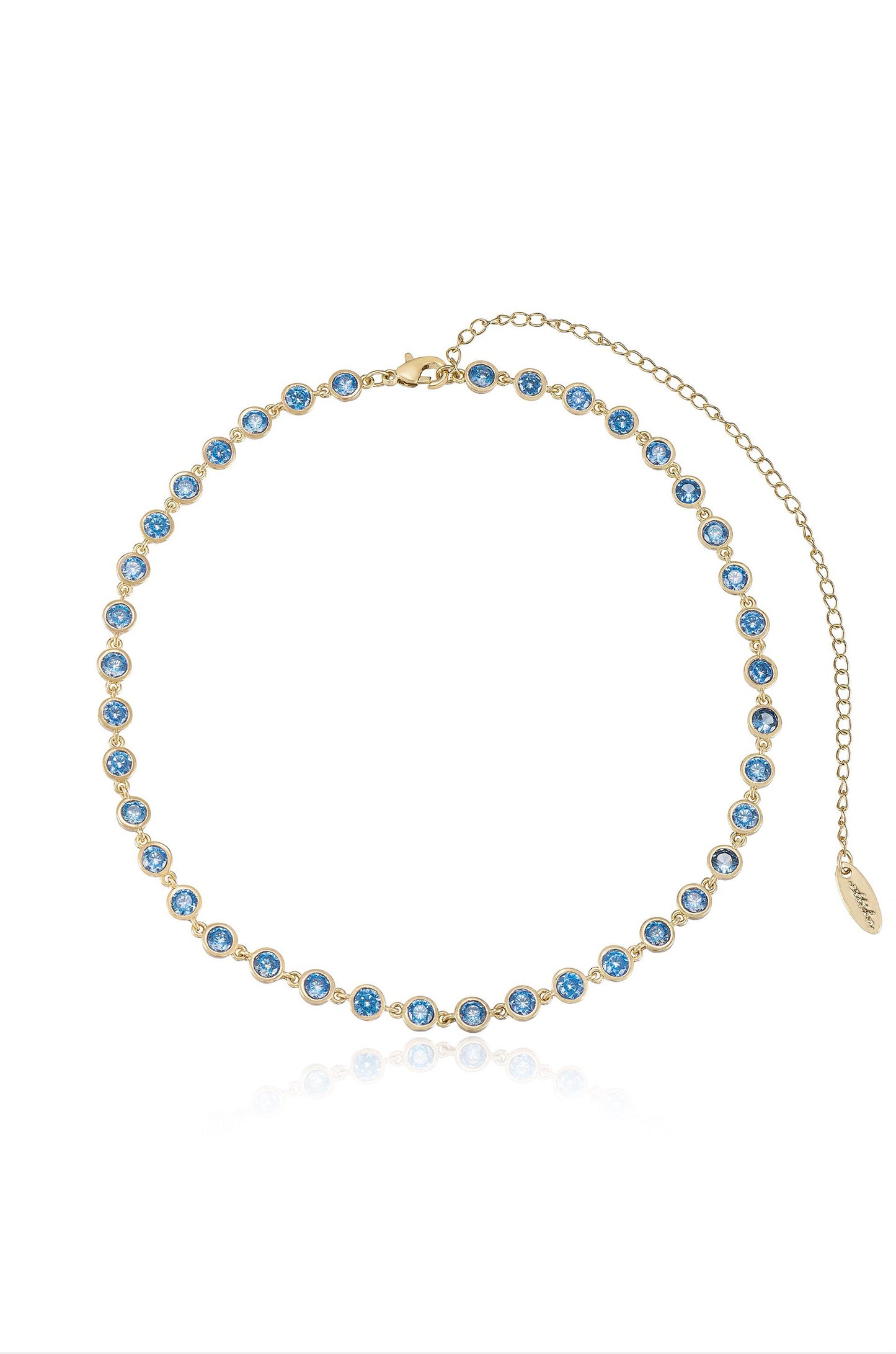 A gold necklace features a symmetrical arrangement of circular blue stones, reflecting light and paired with an adjustable clasp, set against a white background.