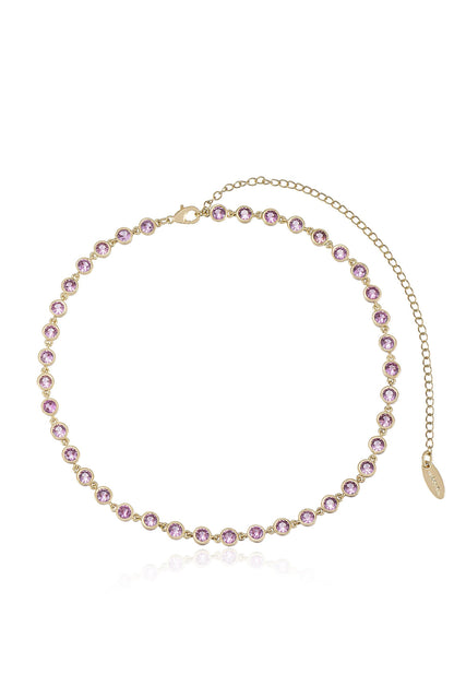 A delicate gold necklace features a series of sparkling pink gemstones set in a clean design, displaying elegance and charm, suitable for various occasions or outfits.