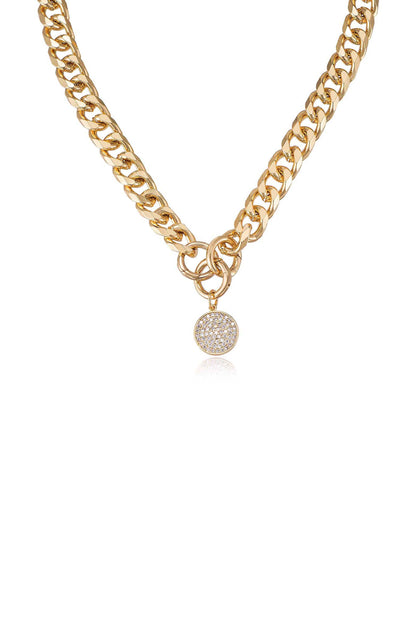 A gold chain necklace hangs down, featuring interlinked links with a smaller circular pendant adorned with sparkling stones. The background is plain white, enhancing the necklace's shine.