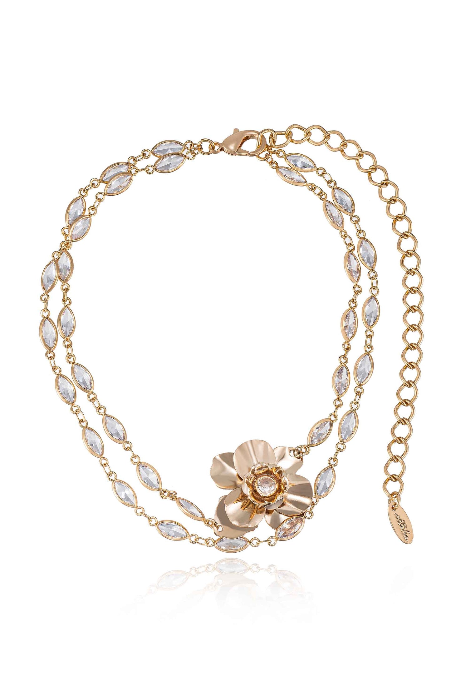 A delicate gold bracelet features a floral design at its center, adorned with sparkling stones. It displays elegance and charm, ideal for formal occasions or daily wear.