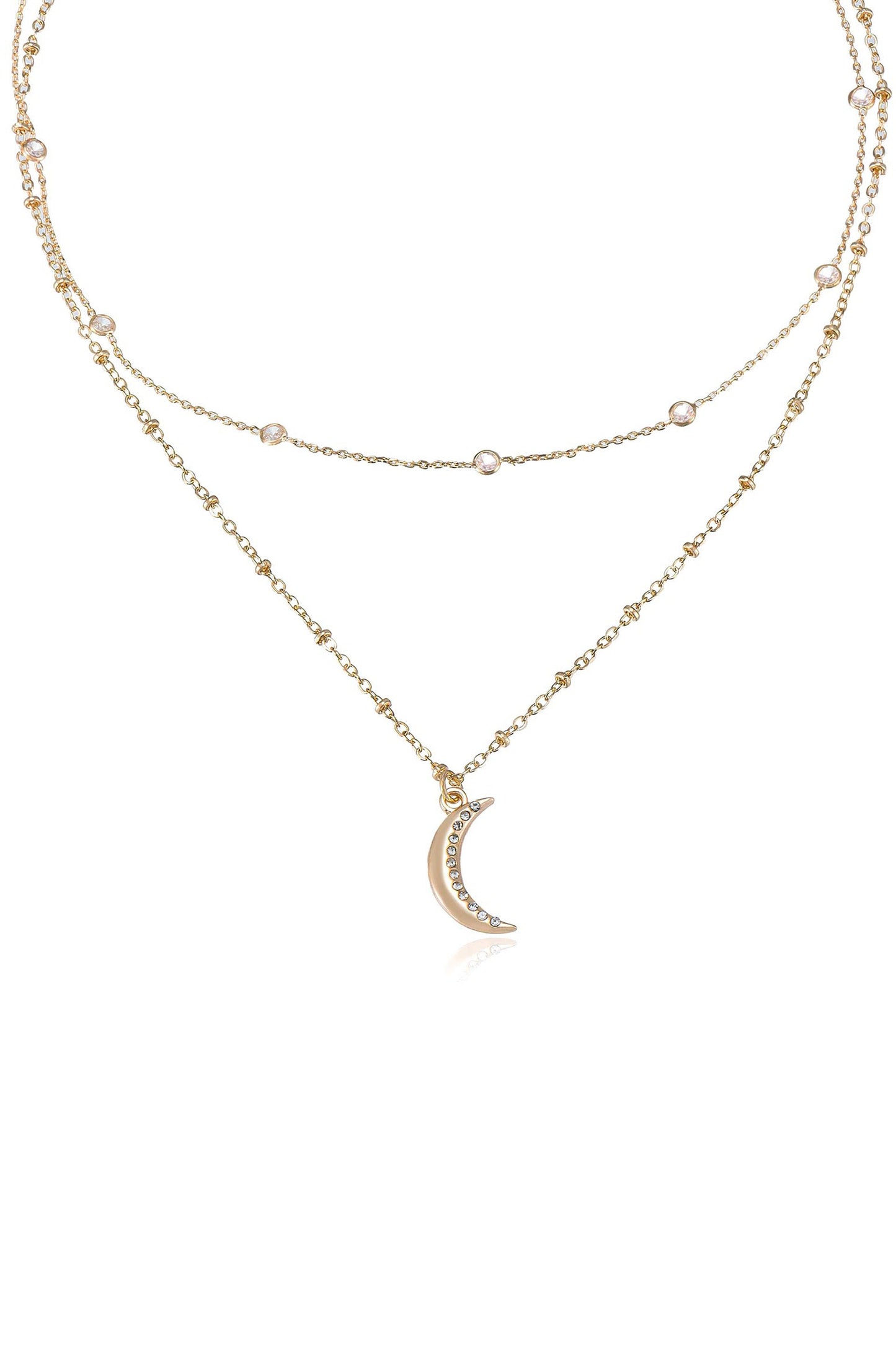 A gold necklace features two delicate chains with small round beads, anchored by a crescent moon pendant adorned with sparkling rhinestones, set against a plain white background.