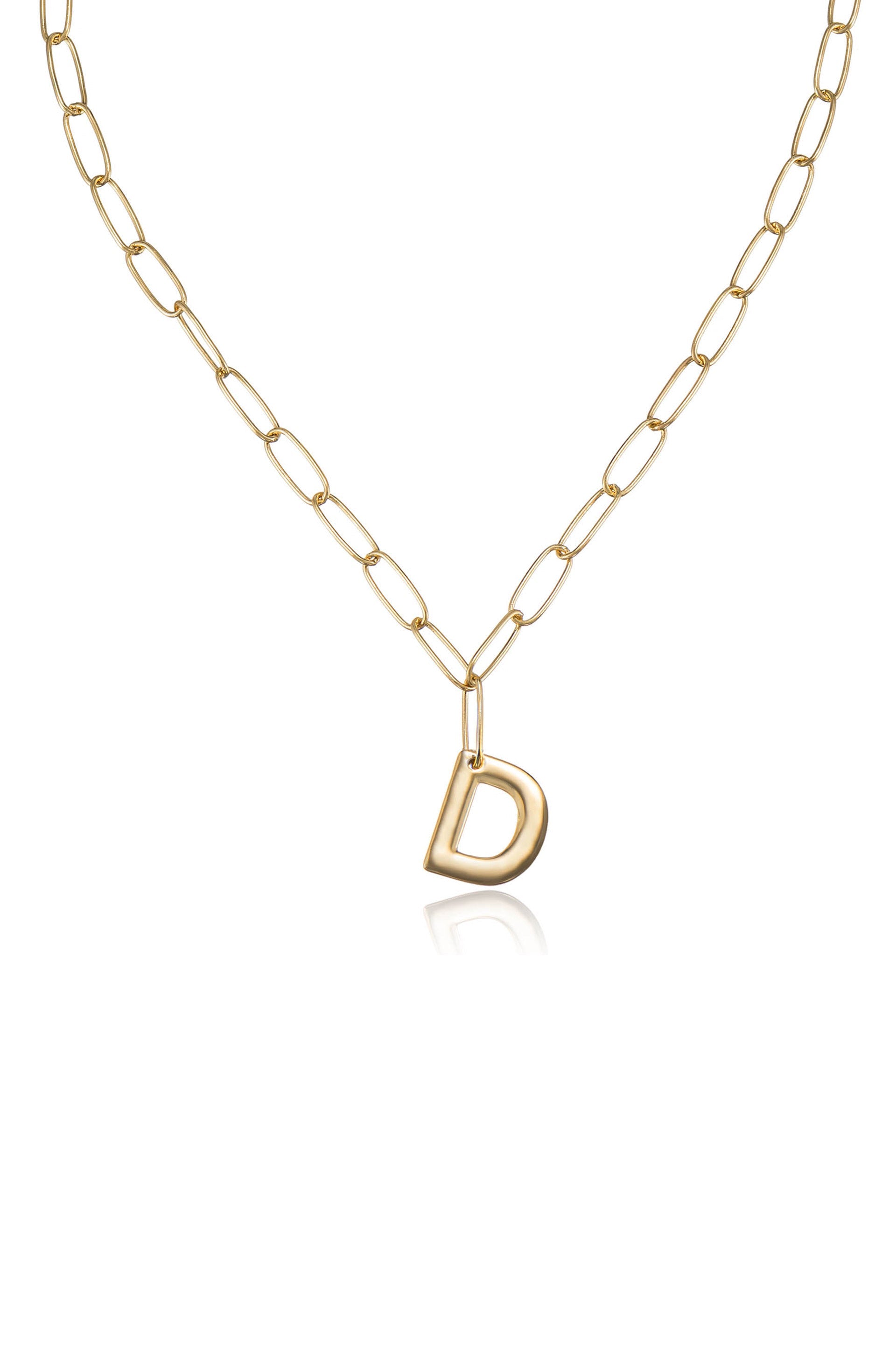 A gold chain necklace features elongated links, with a prominent, polished letter "D" pendant hanging at the center. The background is plain, highlighting the jewelry item.