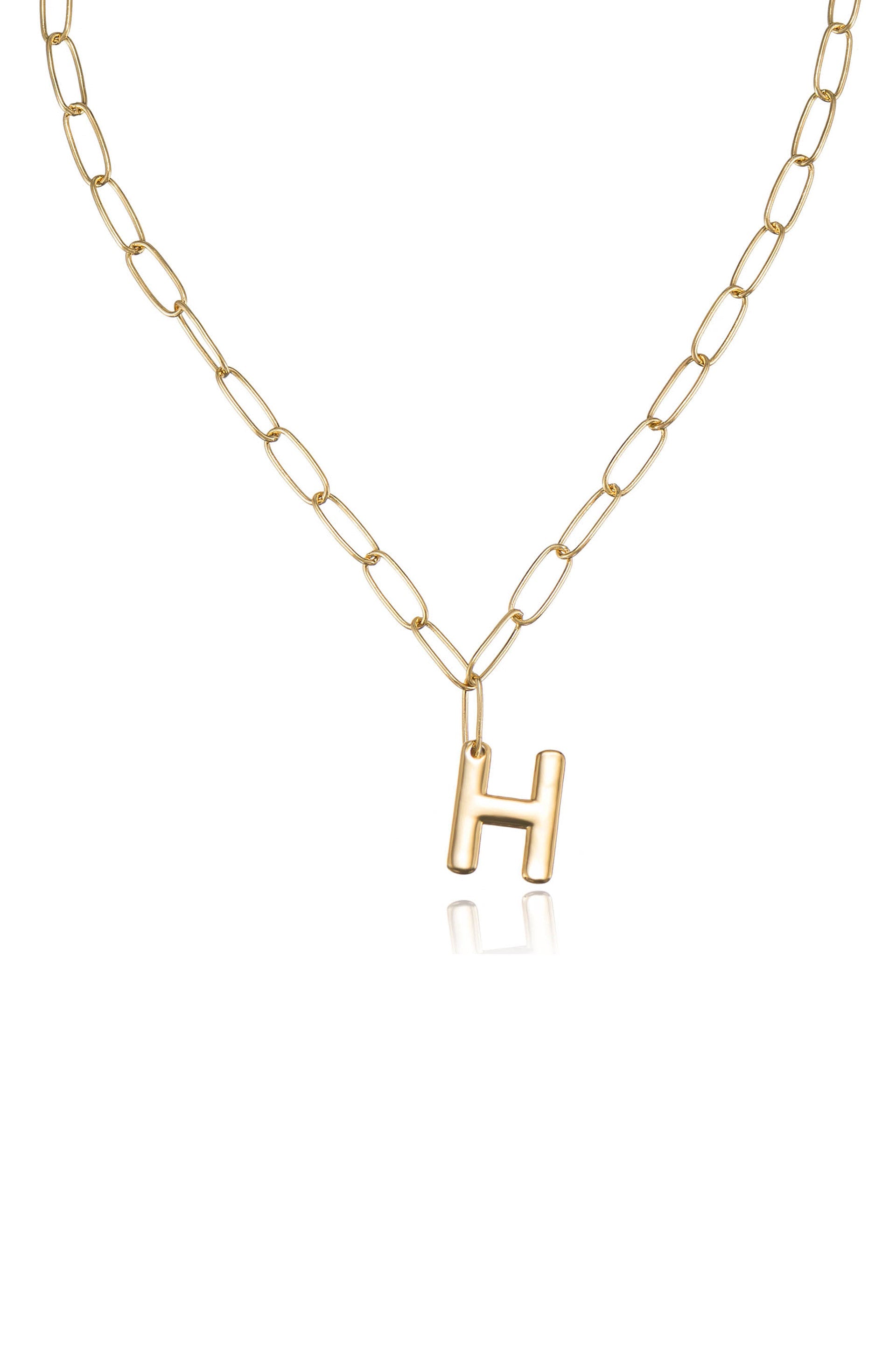 A gold chain necklace features elongated links and a prominent letter "H" pendant. The necklace is displayed against a clean, white background, emphasizing its shiny and elegant design.