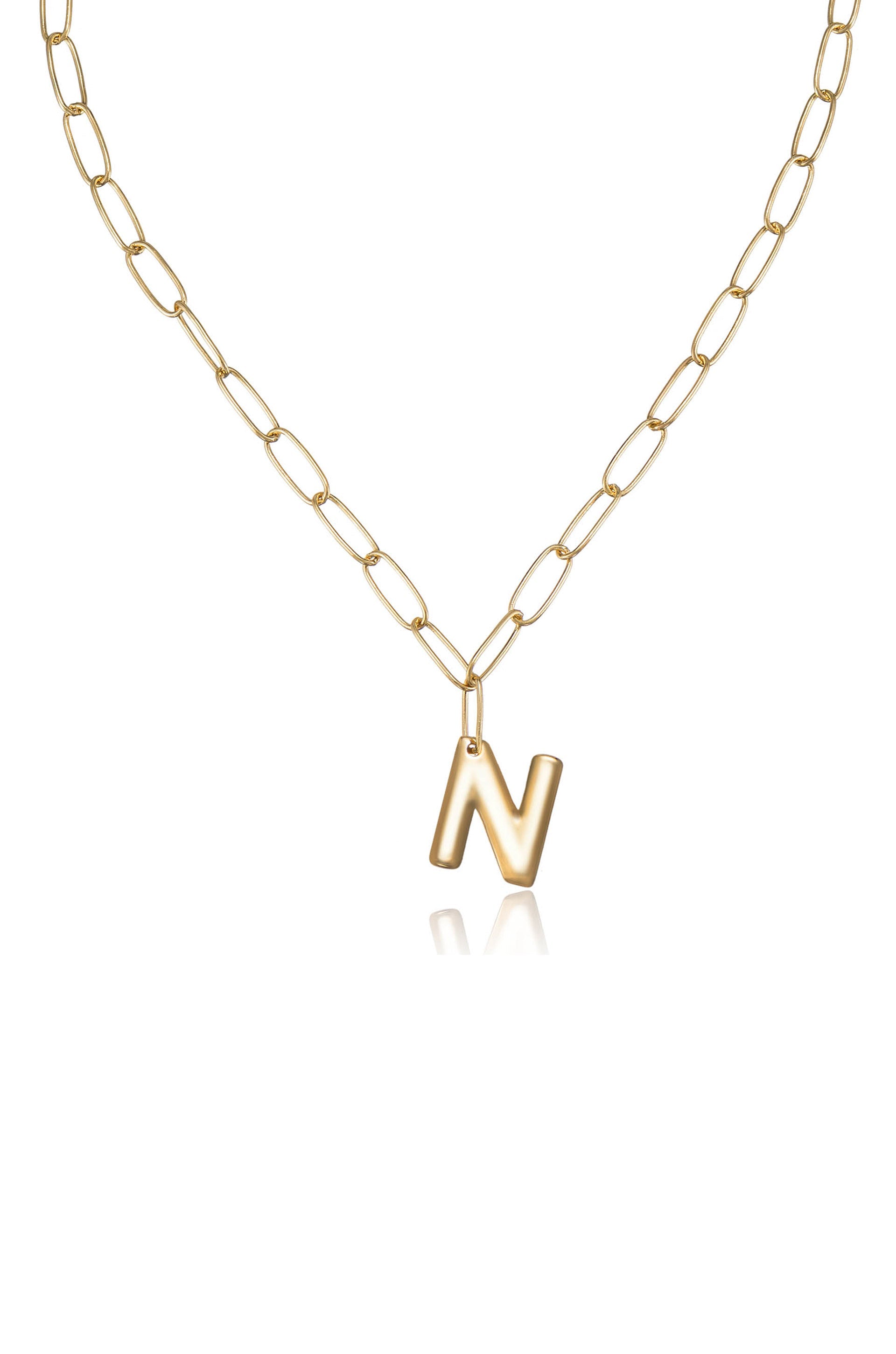 A gold chain necklace features a bold, gold letter "N" pendant hanging from it. The necklace is displayed on a white background, emphasizing its shine and design.