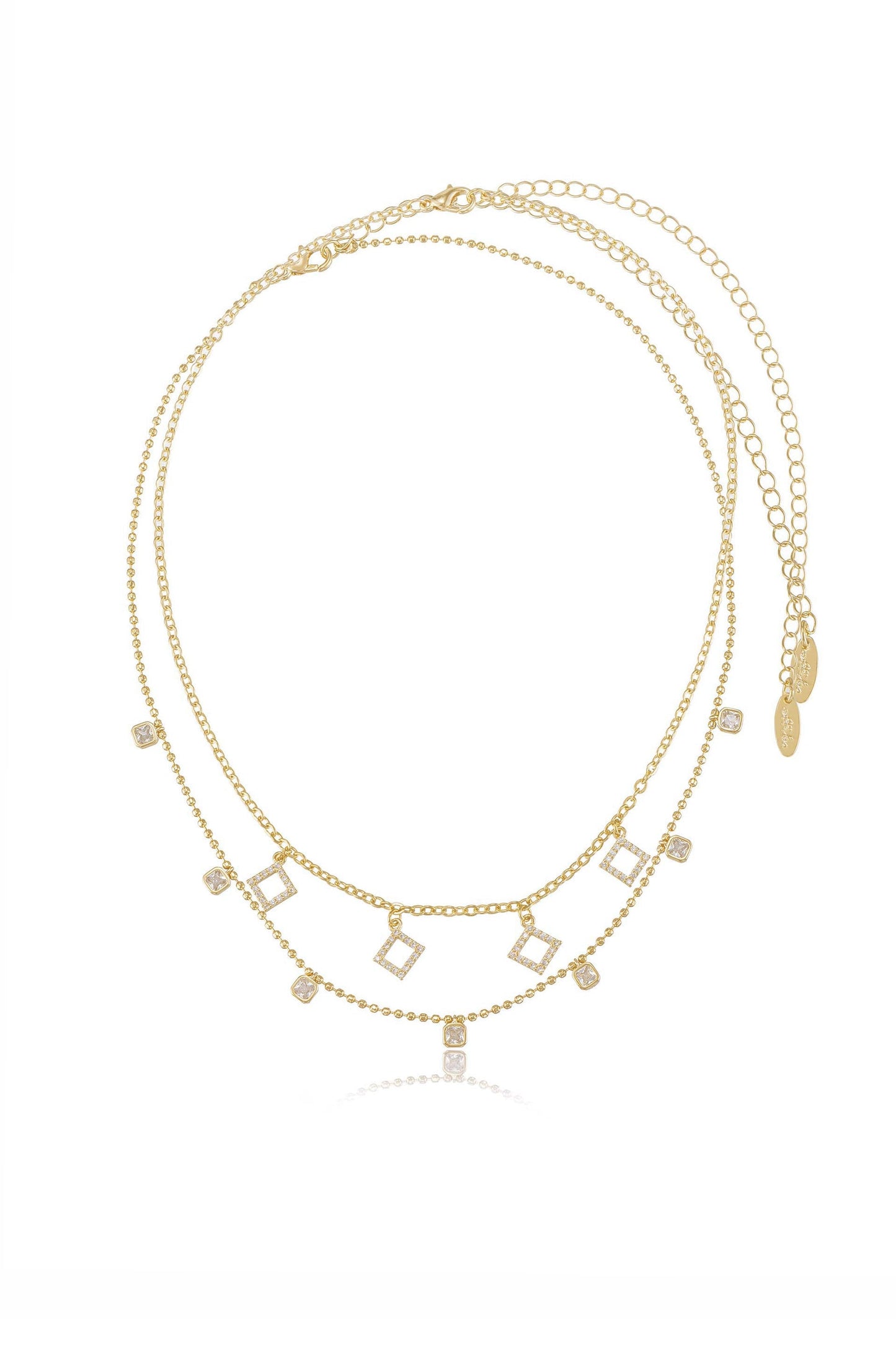 A multi-layer gold necklace features interconnected chains decorated with small square-shaped pendants, some embellished with sparkling stones, displayed against a plain white background.