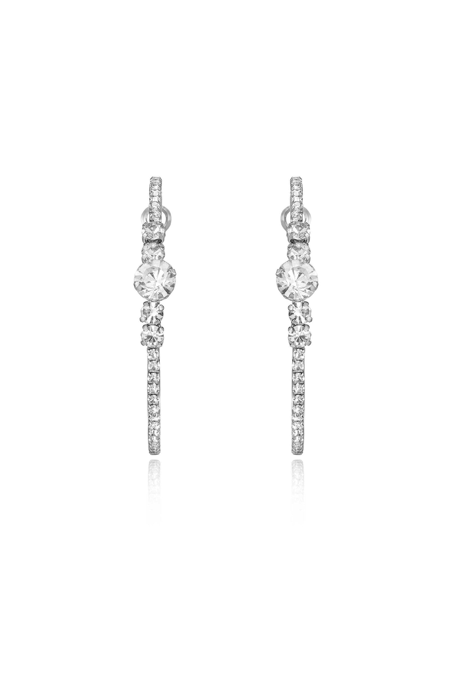 Two elegant earrings featuring sparkling gems, positioned symmetrically. They appear to dangle freely, reflecting light, on a plain white background, emphasizing their shine and design.