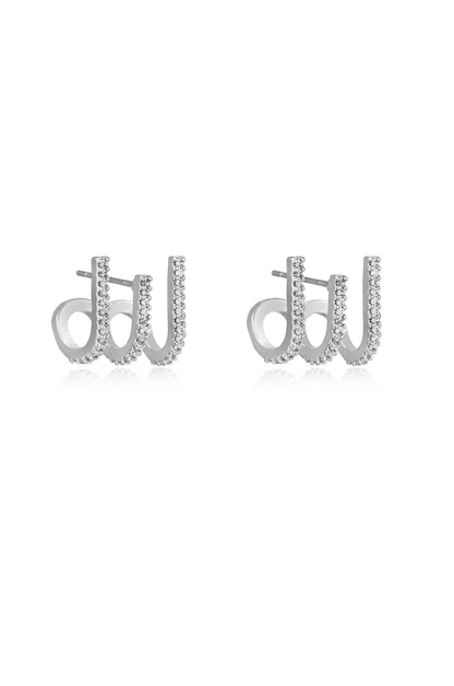 Silver earrings shaped like the letters "d" and "w," adorned with small sparkling stones. They are displayed against a plain white background.