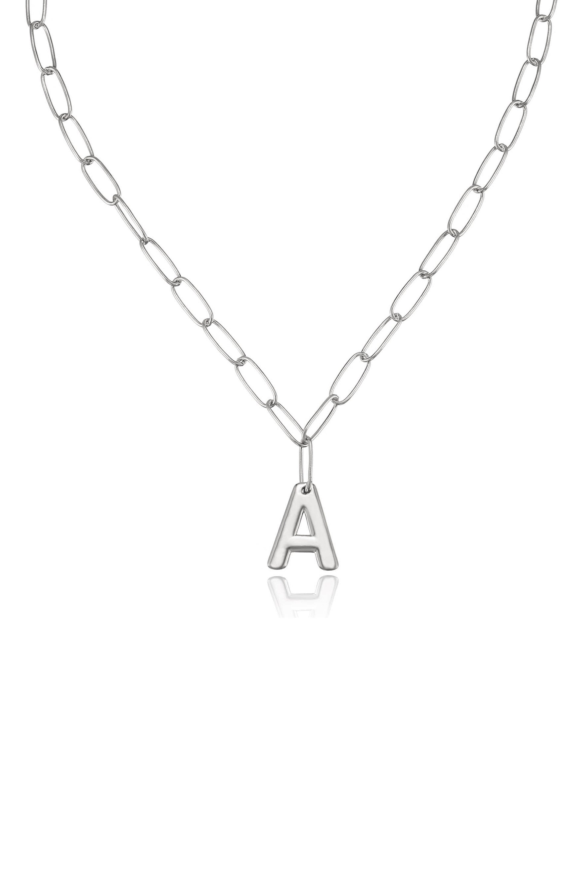 A silver chain necklace features elongated links and a prominent letter "A" pendant, reflecting light. The simple design suggests a casual yet stylish accessory suitable for everyday wear.