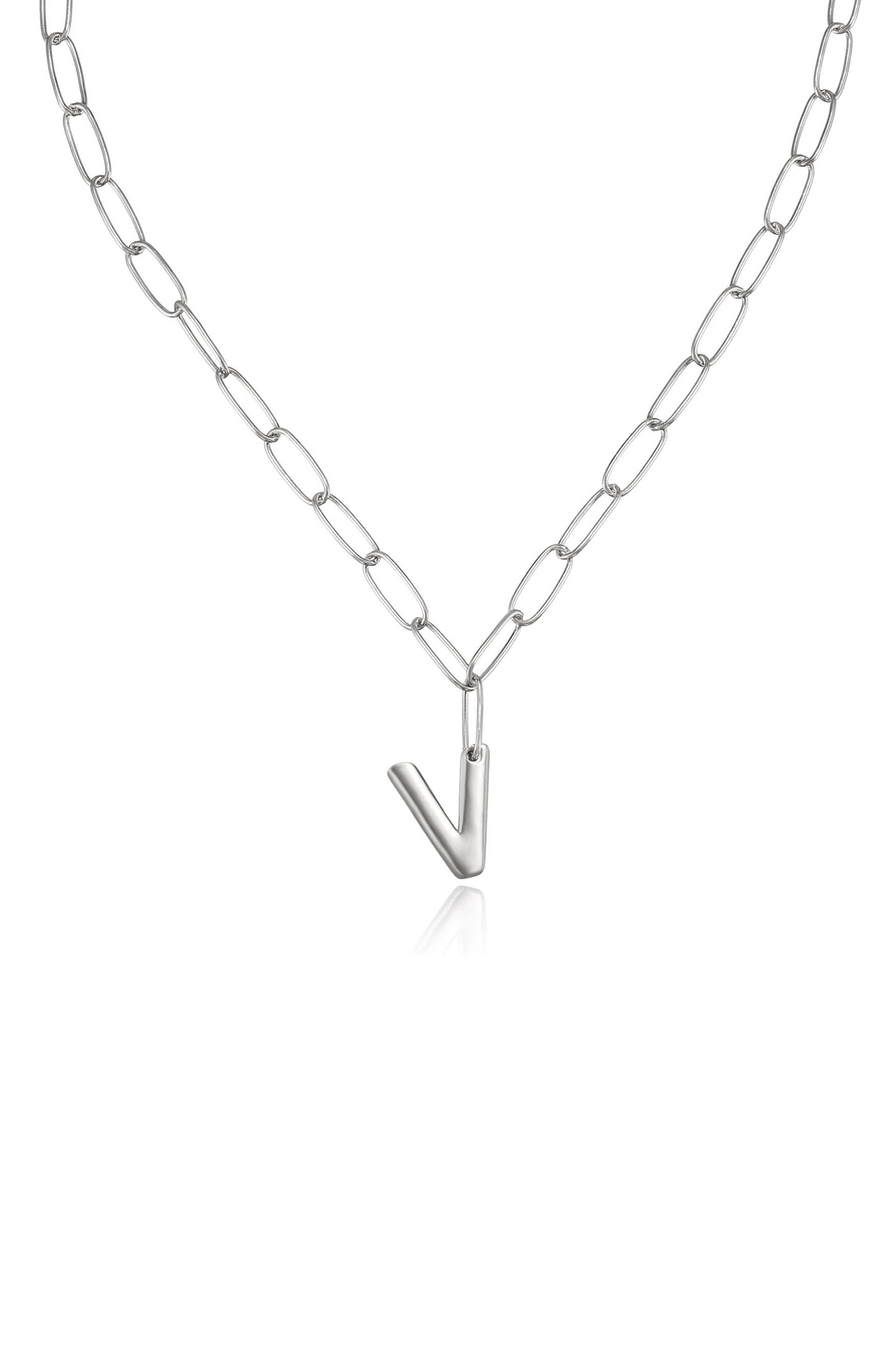 A silver chain necklace features elongated links with a prominent, metallic 'V' shaped pendant hanging at the center, designed to be worn as a fashion accessory.