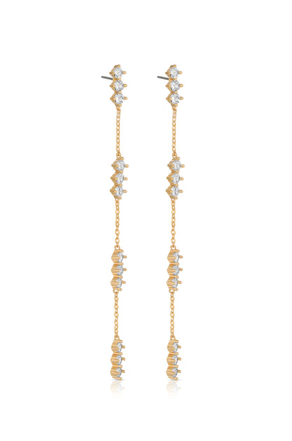 Stylish earrings designed with a gold chain featuring alternating patterns of gold and sparkling stones. They dangle elegantly, suitable for a fashionable occasion or evening wear.