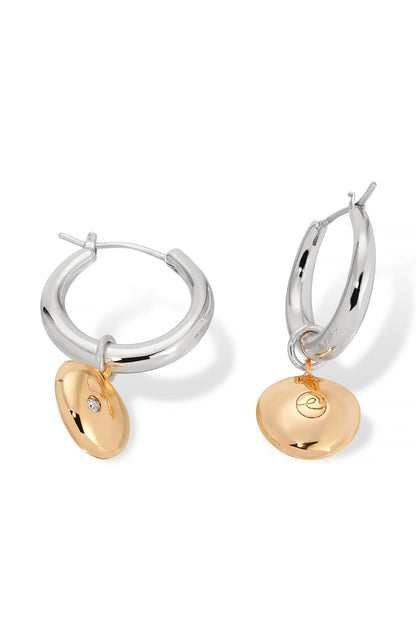 Hoop earrings feature a polished silver base with a glossy gold pendant. The pendants are attached with small rings, reflecting light against a simple, white background.