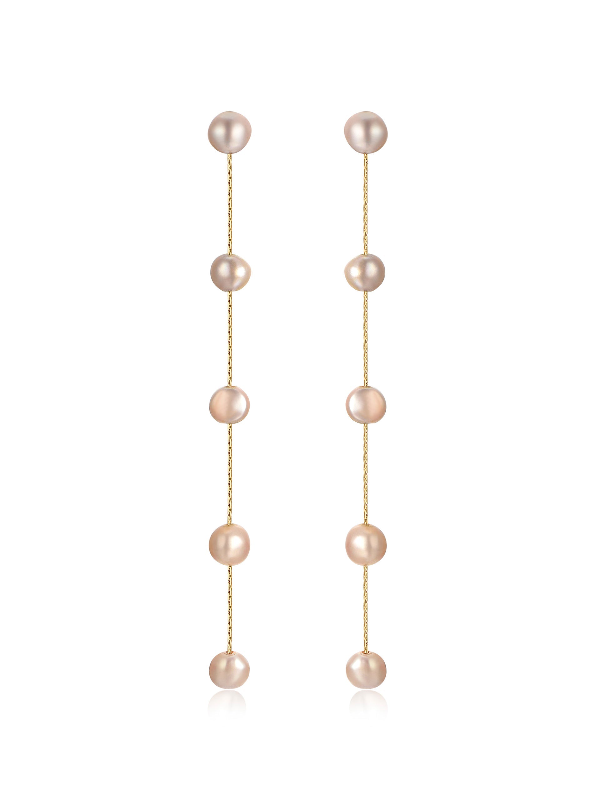 Elegant, elongated earrings featuring a series of pink pearls strung together by thin gold chains, suitable for enhancing formal attire or special occasions. The reflective surface adds sophistication.