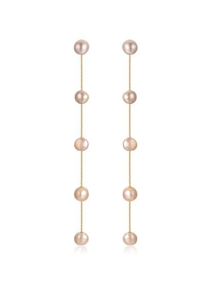 Elegant, elongated earrings featuring a series of pink pearls strung together by thin gold chains, suitable for enhancing formal attire or special occasions. The reflective surface adds sophistication.