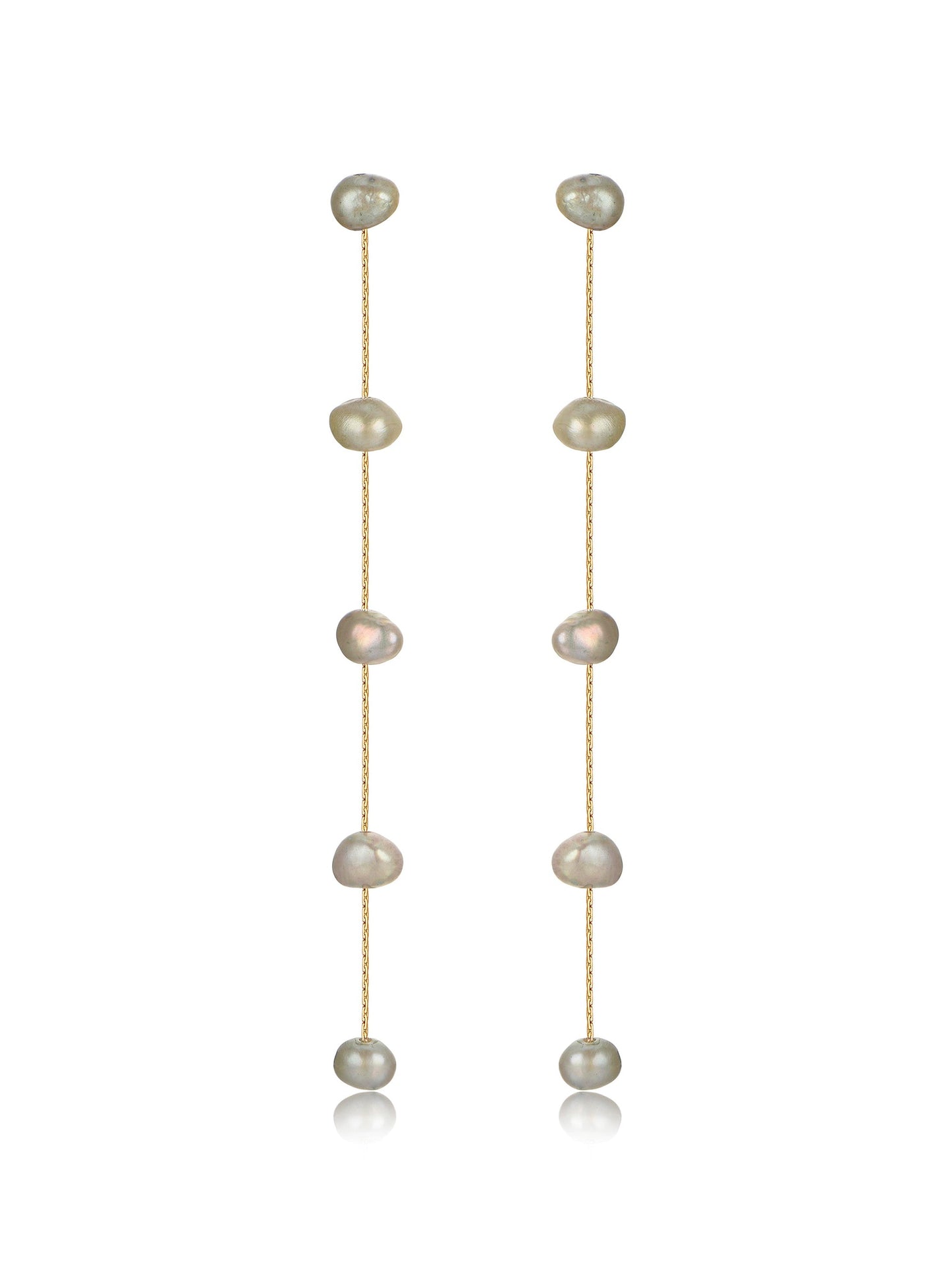 Two delicate earrings hang vertically, featuring a series of irregularly shaped pearls strung on thin gold chains, with a smooth, reflective surface enhancing their elegance against a plain background.