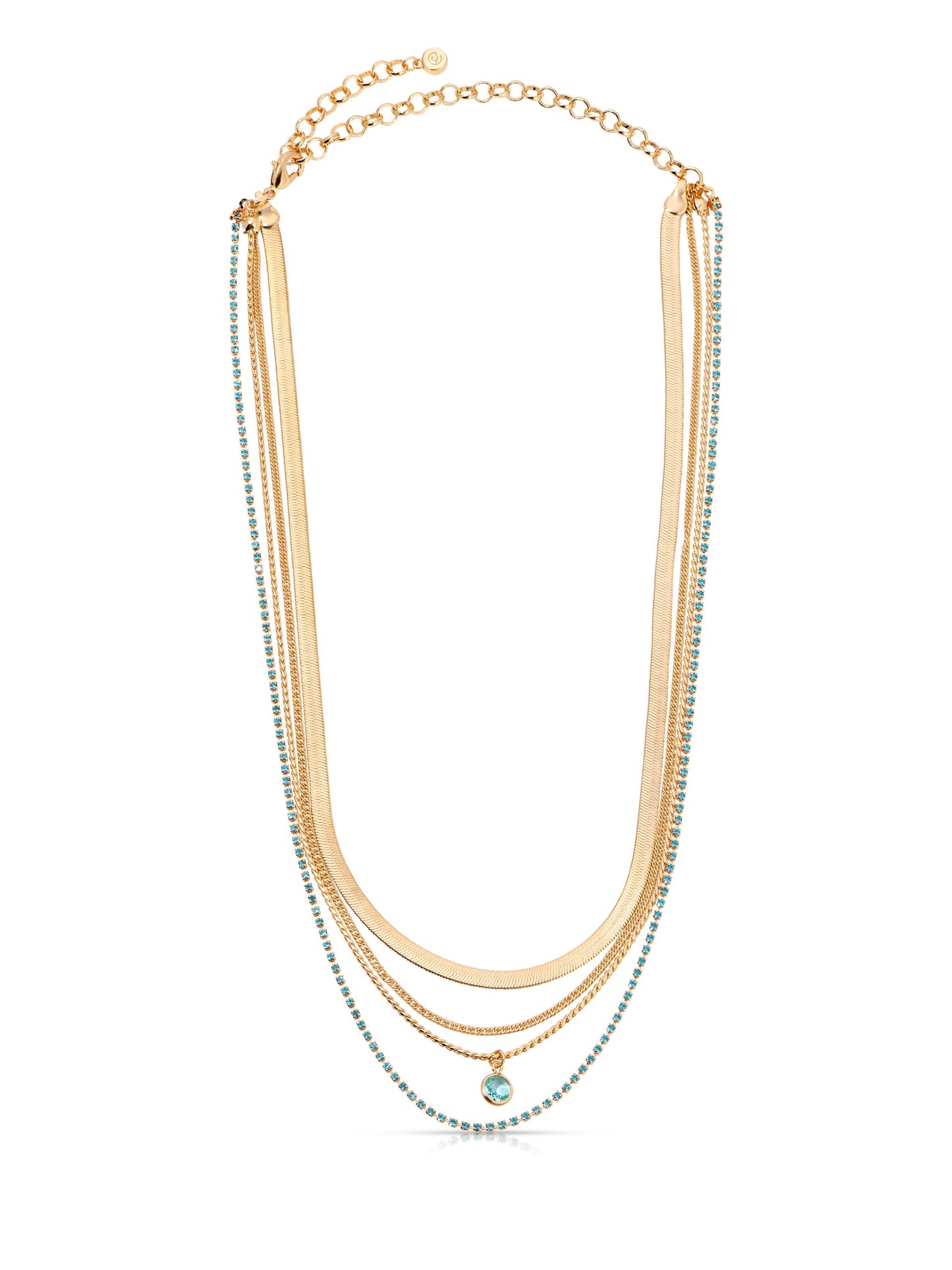 A layered gold necklace features multiple chains, including a delicate link chain with small blue beads. It has a circular pendant at the center, enhancing its elegance.