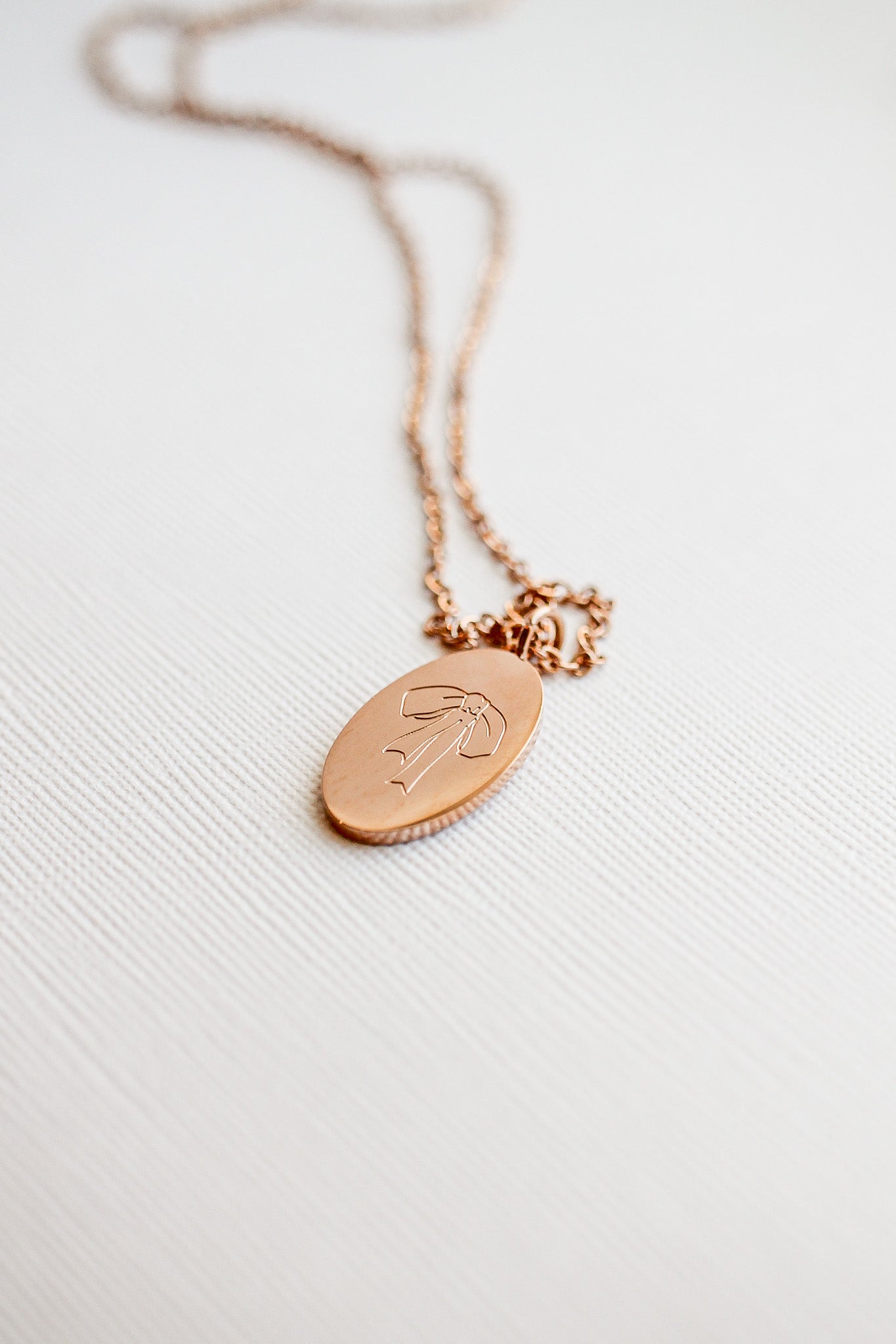 Bow Pendant Necklace in Rose Gold