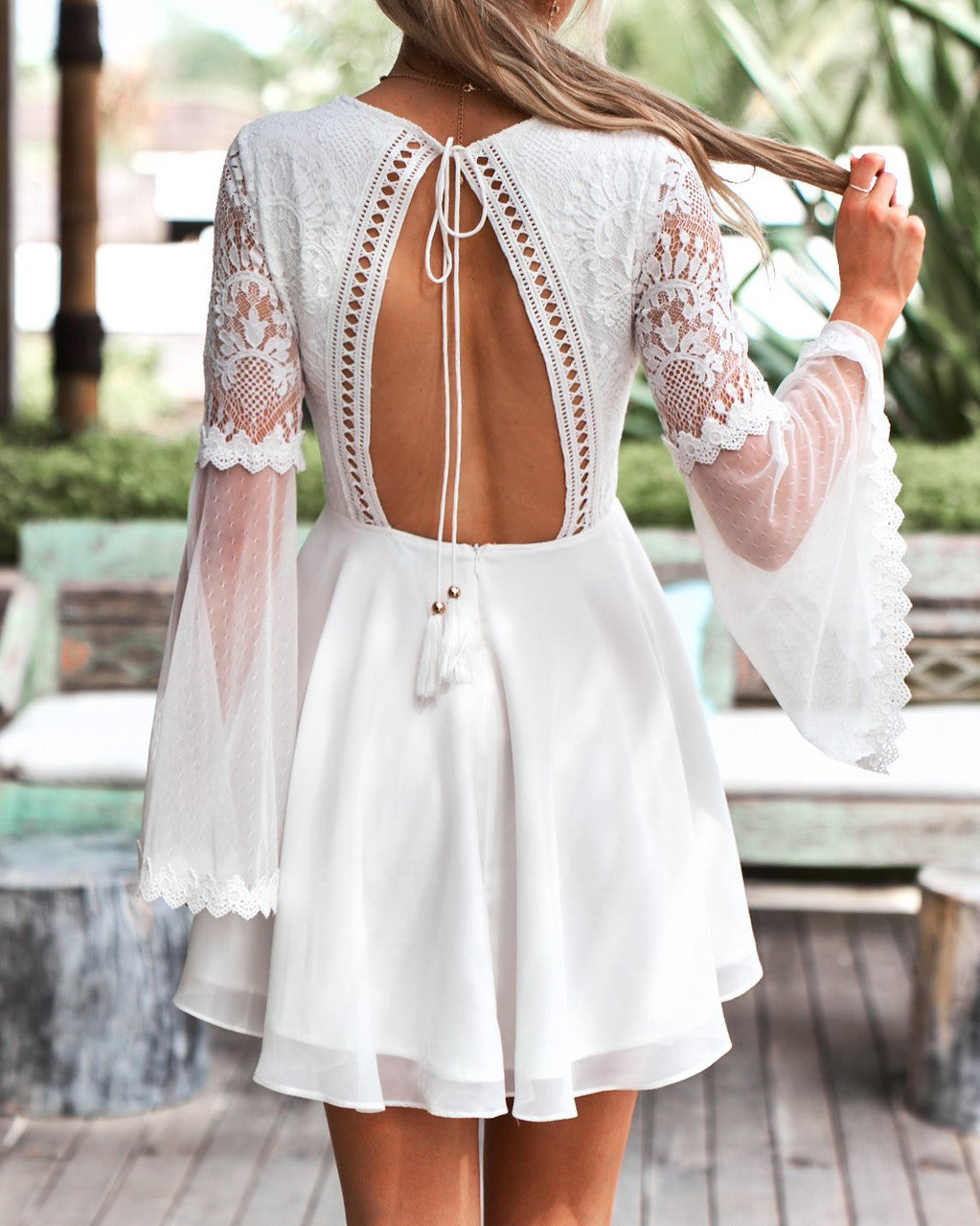 The Bethany dress in White by Two Sisters the Label. White bell sleeve boho dress with open back.